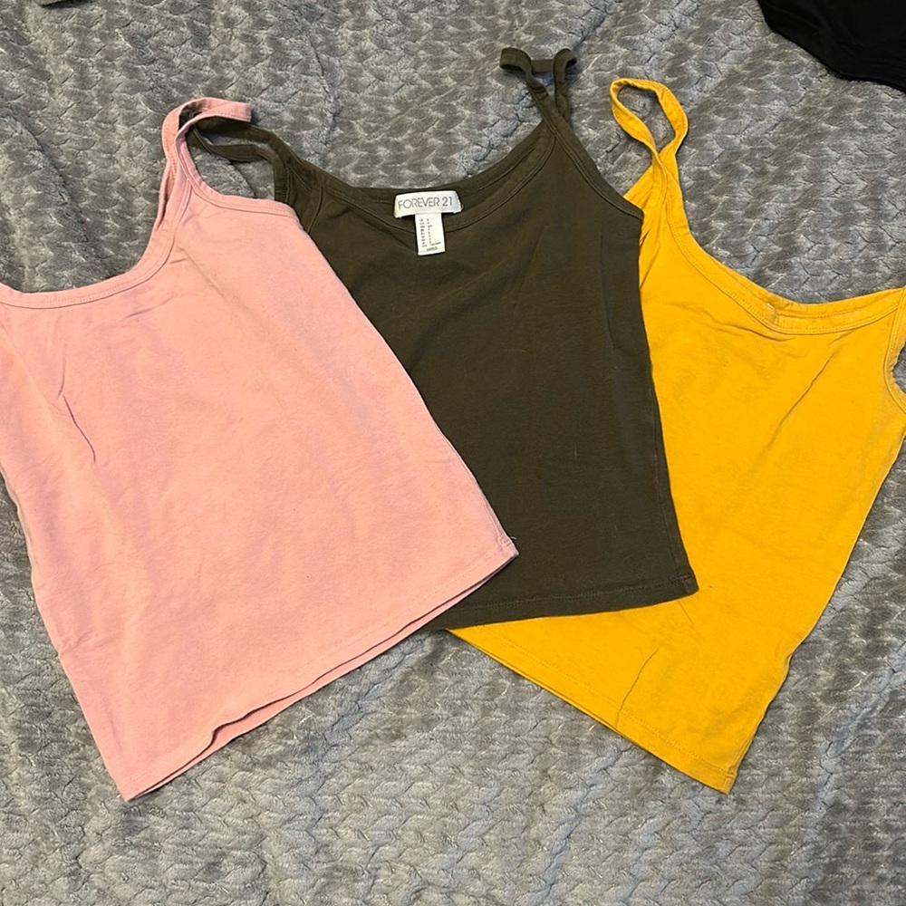 3 camis in baby pink, mustard, and olive green